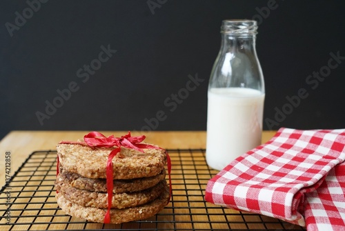 stack of cookies and bottle of milk