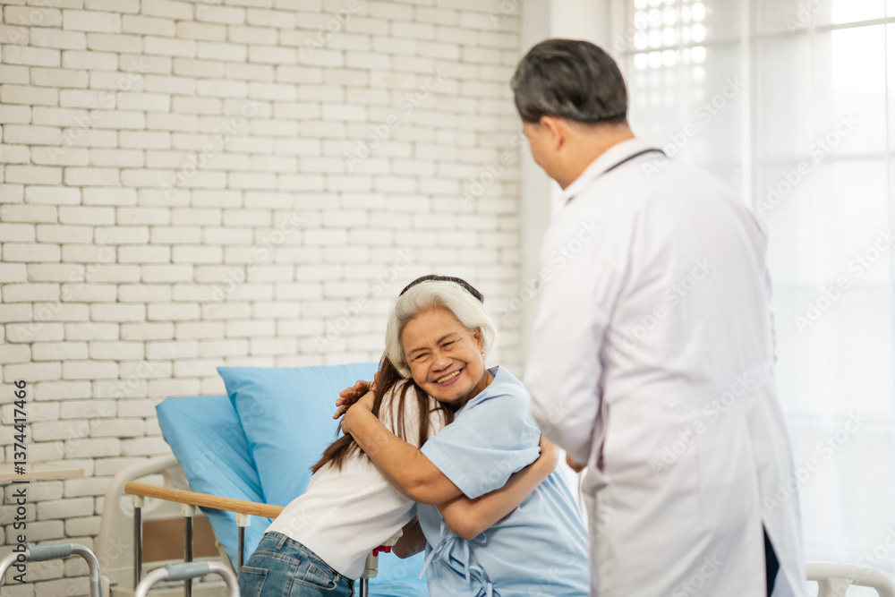 Obraz premium Senior elderly woman delighted after receiving treatment at clinic, hugging with her daughter while Physician doctor standing at bed.
