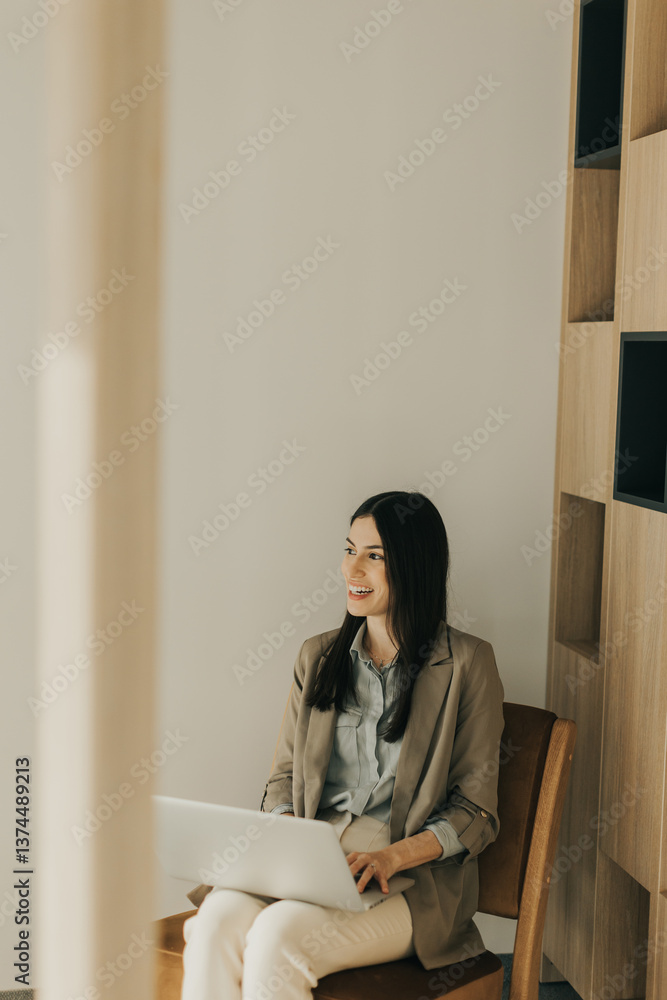 Working in solitude a woman finds joy in her digital creations at a cozy workspace Working in solitude a woman finds joy in her digital creations at a cozy workspace