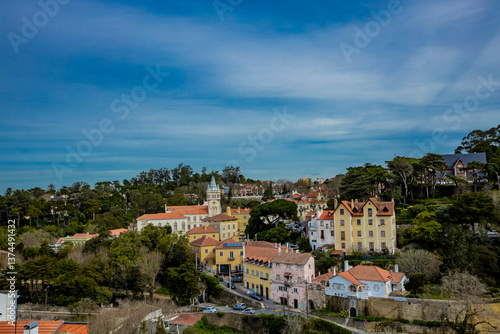 Colorful buildings and lush...