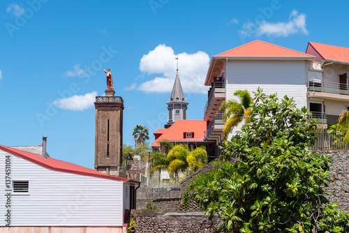 Obraz na płótnie Buildings with red rooftops and church tower in city centre of Basse-Terre, Guadeloupe w salonie