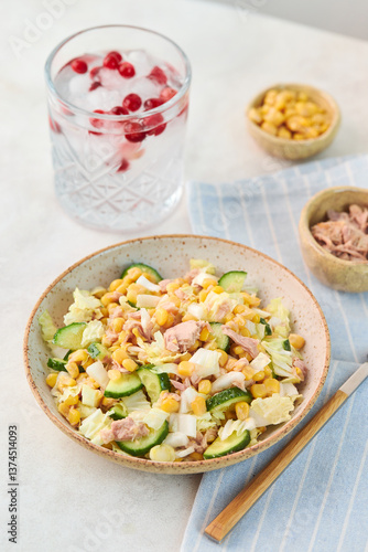 Fresh tuna salad with crisp cucumber and refreshing drink