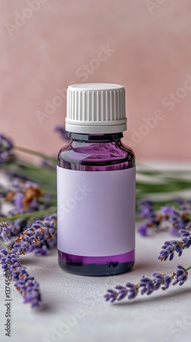 Lavender Essential Oil Bottle Surrounded by Fresh Lavender Flowers on a Soft ...
