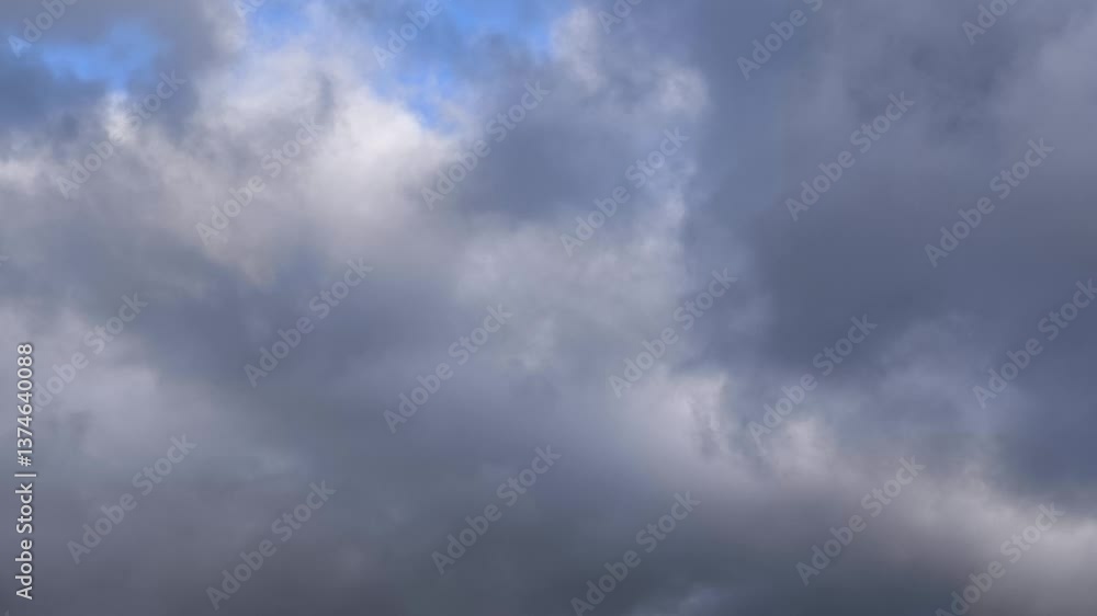 Dark blue clouds in the sky at dusk Dark blue clouds in the sky at dusk