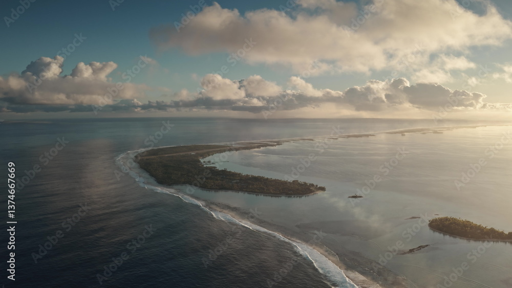 An aerial perspective captures a stunning coastal landscape where clear blue waters meet a lush green island. Gentle waves lap against the shore under a dramatic sky filled with clouds during sunset. An aerial perspective captures a stunning coastal landscape where clear blue waters meet a lush green island. Gentle waves lap against the shore under a dramatic sky filled with clouds during sunset.