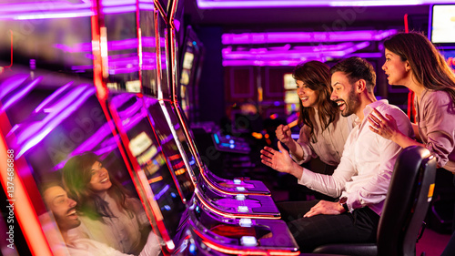 Photos Group of Friends Enjoying Slot Machines in a Vibrant Casino Setting