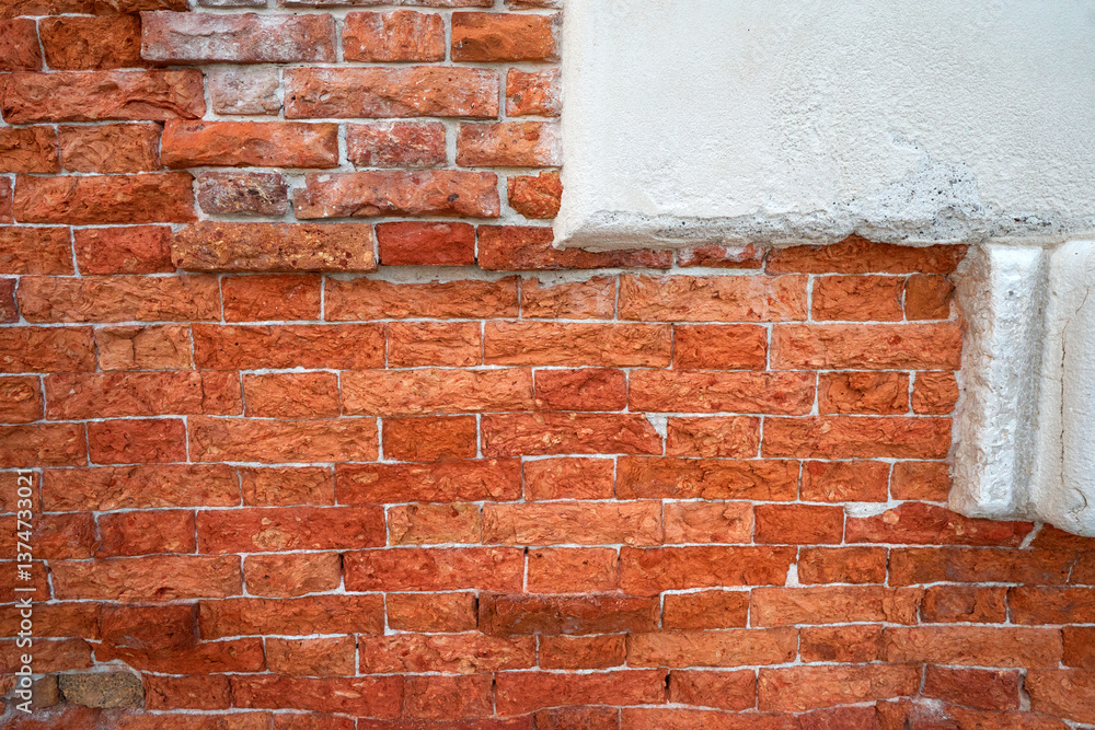 Fototapeta premium Old red brick background at natural light