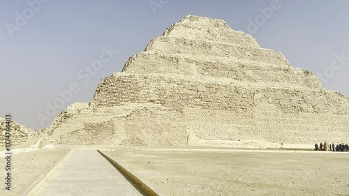Explore the grand Step Pyramid of Djoser in Saqqara, Egypt, a remarkable structure belonging to the ancient Egyptian city of Memphis. Witness its historical significance.