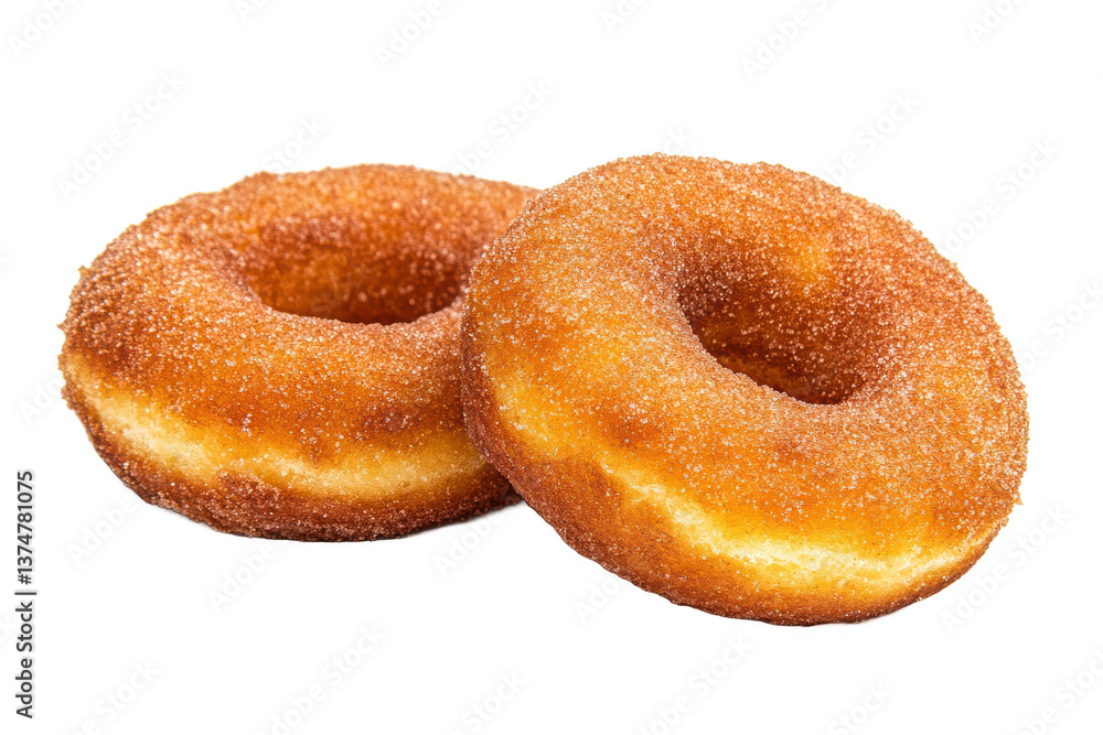 Close up of two cinnamon sugar donuts with a golden color on a black background studio shot Close up of two cinnamon sugar donuts with a golden color on a black background studio shot