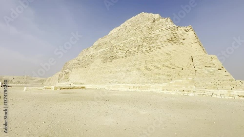 Explore Zoser's grand Step Pyramid in Saqqara, Egypt, a key feature of the ancient Memphis Necropolis. Discover the history and architectural marvel of this site.