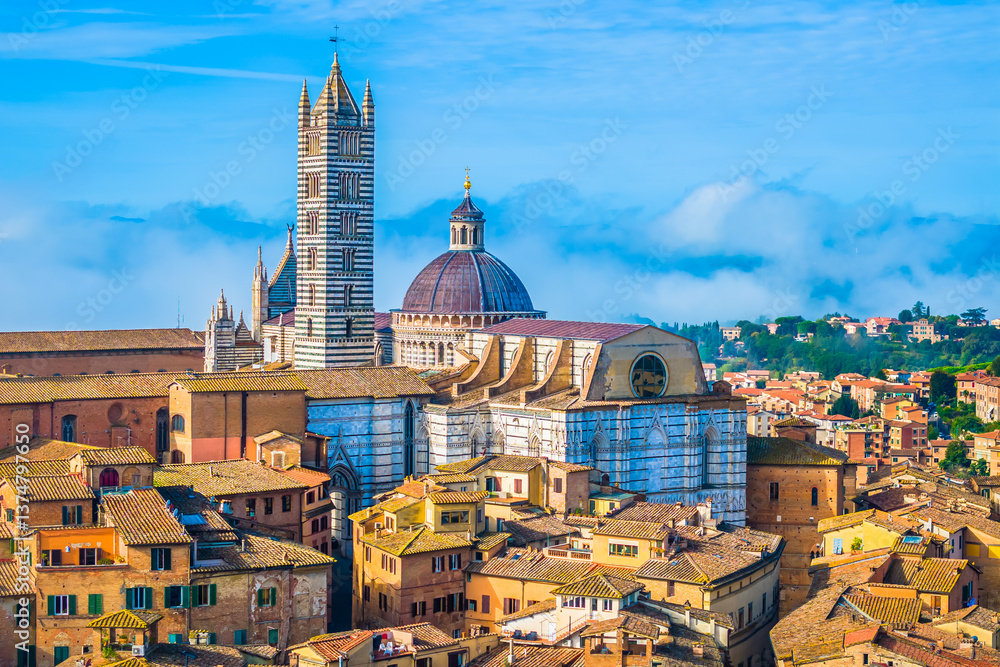Naklejka premium Aerial view of Siena cityscape in the heart of Tuscany, showcasing its intricate Gothic architecture, towering bell tower, and striped marble facade, surrounded by the terracotta rooftops