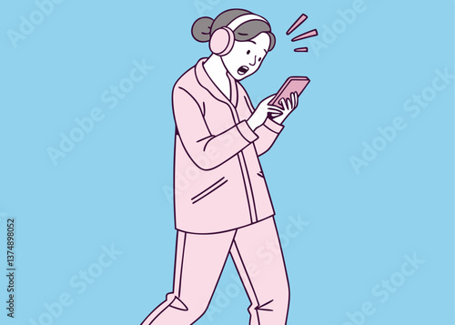Asian woman in pink pajamas wearing headphones looks shocked while staring at her pink smartphone, standing against a solid blue background, reacting strongly to something unexpected