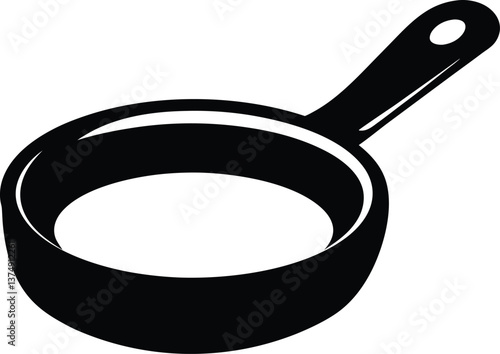 Isolated cast iron frying pan on a white backdrop