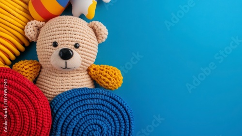 Colorful Teddy Bear and Playful Toys on Bright Blue Background