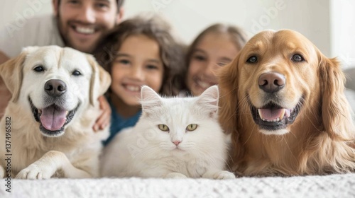 a family with two dogs and one cat.