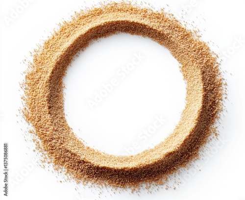Top Down View of Golden Sand Particles Forming a Circular Design on a White Background for Beach Themed Minimalist Composition