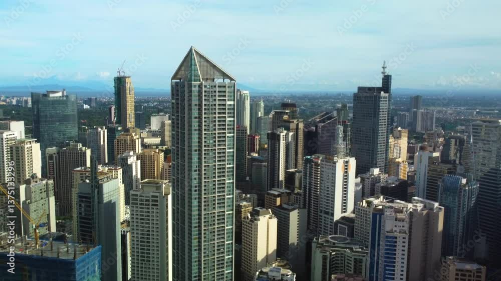 Aerial view of high-rise in the Makati business district, golden hour in Manila Aerial view of high-rise in the Makati business district, golden hour in Manila