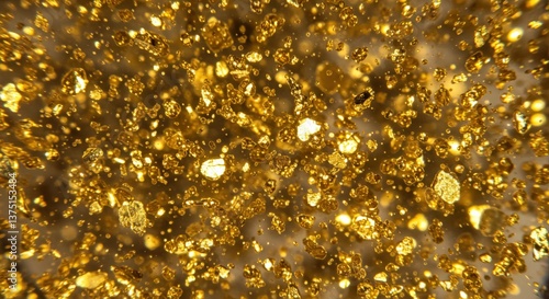 A Close-Up View of Glittering Golden Particles Sparkling in Natural Light, Capturing the Beauty of Gold Dust and Its Textures in Various Sizes