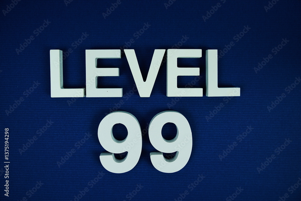 Level 99 Level Ninety-nine alphabet letters on navy blue background Level 99 Level Ninety-nine alphabet letters on navy blue background