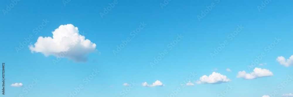 A solitary white cloud drifts lazily across a bright blue sky with a few scattered clouds in the distance, weather, landscape A solitary white cloud drifts lazily across a bright blue sky with a few scattered clouds in the distance, weather, landscape