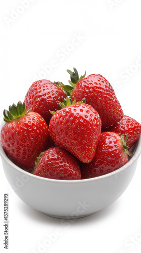 Freshly washed strawberries in white bowl on white background