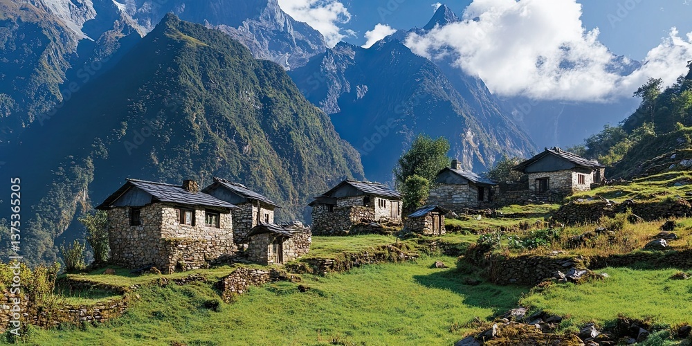 Obraz premium A remote mountain village with traditional stone houses, set against a backdrop of towering peaks. 