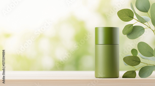 Wallpaper Mural Green cosmetic bottle resting on a wooden table with eucalyptus leaves, highlighting natural beauty products against a softly blurred green background Torontodigital.ca