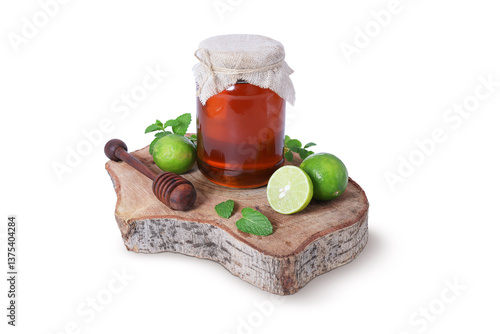 Organic Honey Jar with Fresh Lime, Mint Leaves, and Wooden Honey Dipper on Rustic Wooden Board – Natural Detox and Wellness Concept