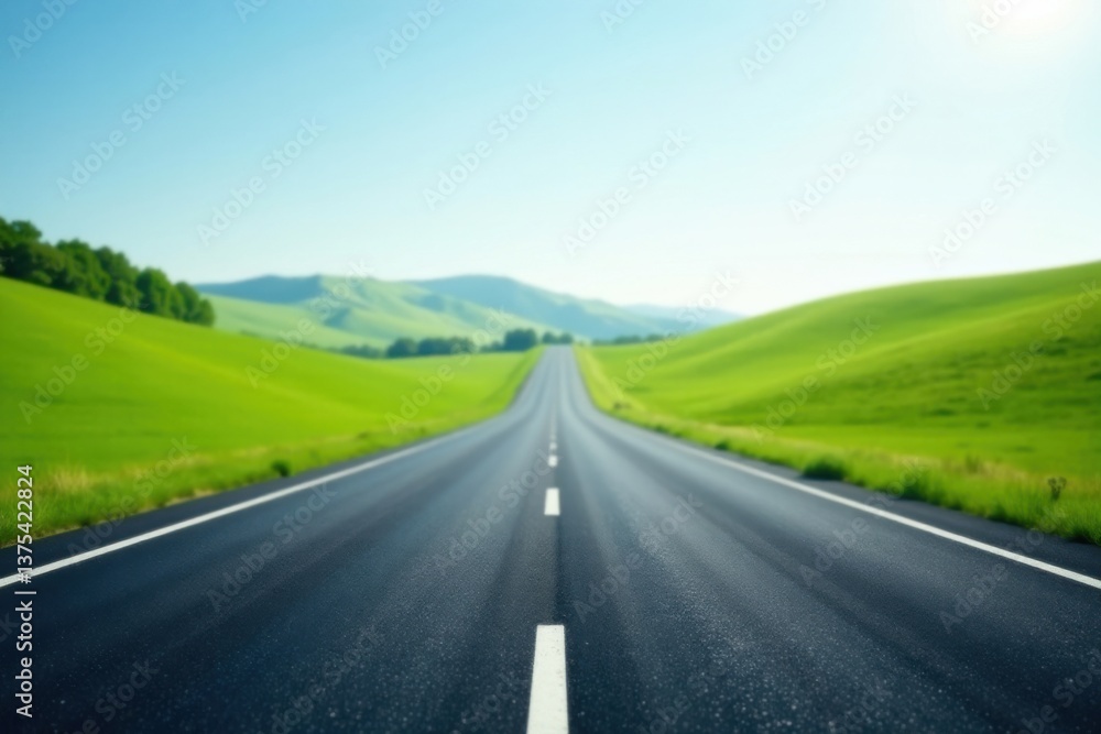 Fototapeta premium Asphalt Road Leading Through Rolling Green Hills Under a Bright Sunny Sky A Journey of Endless Possibilities