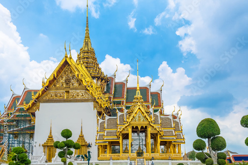 Photography Ornate golden rooftops of Grand Palace in Bangkok, Thailand, showcasing traditio