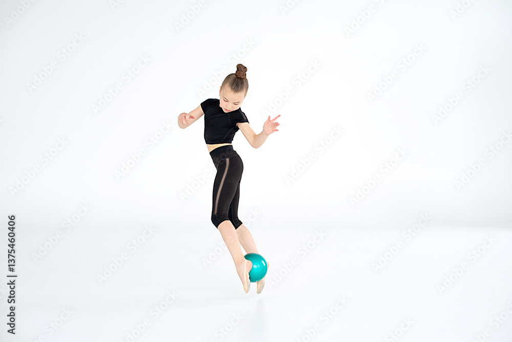 girl, rhythmic gymnast performing with ball, showing skills and stay isolated on white background. Concept of sport, active lifestyle, hobby. girl, rhythmic gymnast performing with ball, showing skills and stay isolated on white background. Concept of sport, active lifestyle, hobby.