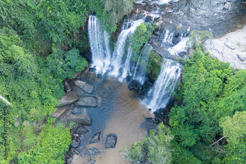 Cambodia, Phnom Kulen, beautiful waterfall is in the middle of a lush green forest