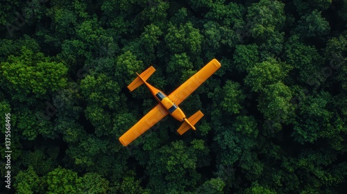 Wallpaper Mural A small orange plane flying smoothly over a dense, green forest in this realistic aerial shot. The natural landscape below contrasts beautifully with the bright plane. Torontodigital.ca