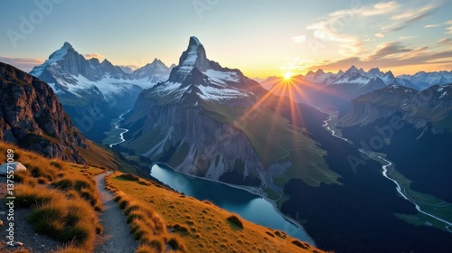 Professional photo of the Valais Alps in Switzerland during dawn, sunny conditions. Captured from above, showcasing the sunlit peaks and valleys in vivid detail.