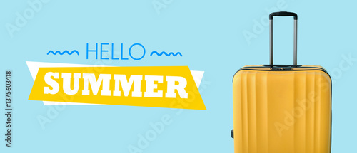 Yellow suitcase on blue bac...