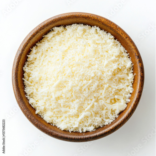 grated Parmesan cheese in a bowl. top view. studio lighting.