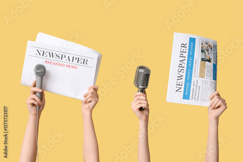 Female hands with newspaper...