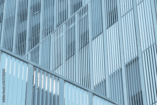 Wallpaper Mural Glass facade with vertical lines and modern geometry, abstract architectural detail perfect for contemporary cityscape, construction and design-focused commercial stock projects Torontodigital.ca