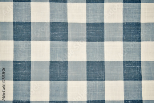Classic checkered gingham fabric pattern in blue and white, perfect for home decor and fashion. This vintage design adds timeless touch to any project