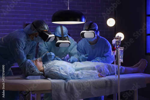 Surgeons with VR glasses op...