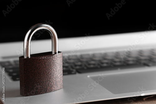 Padlock on laptop, closeup....