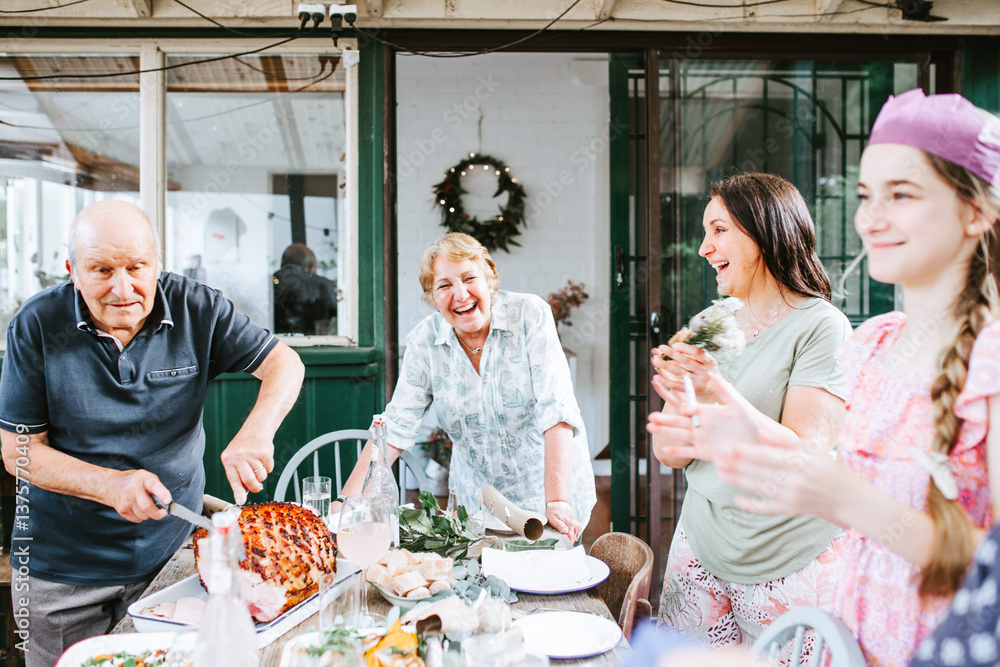 Happy multigeneration family gathered around the table Happy multigeneration family gathered around the table