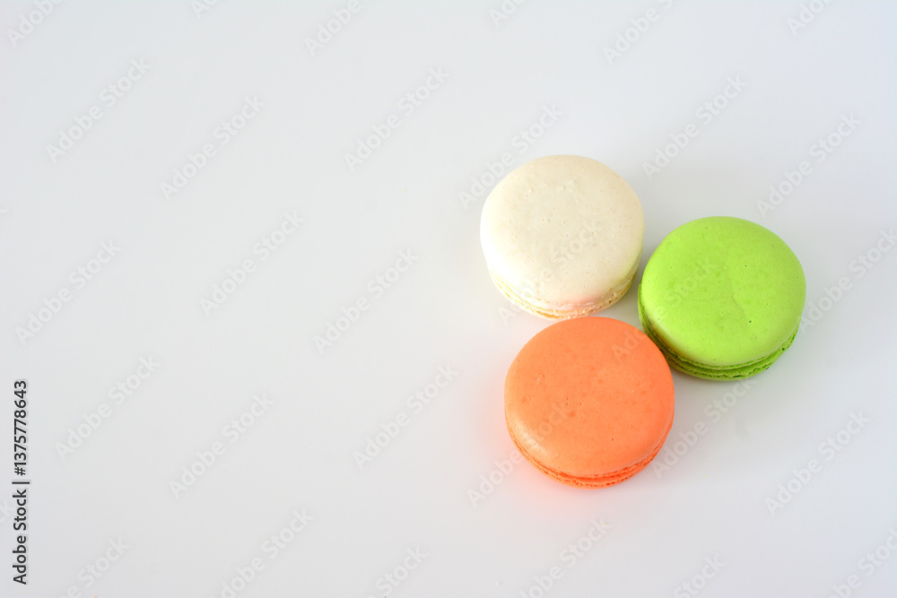 Colorful Macarons on White Background top view Colorful Macarons on White Background top view