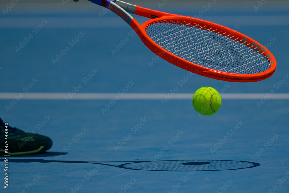 Tennis Racket with ball on Court