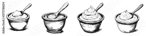 Different types of creamy desserts in small bowls with spoons displayed on a simple background