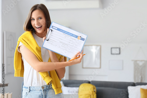 Teenage girl with college a...