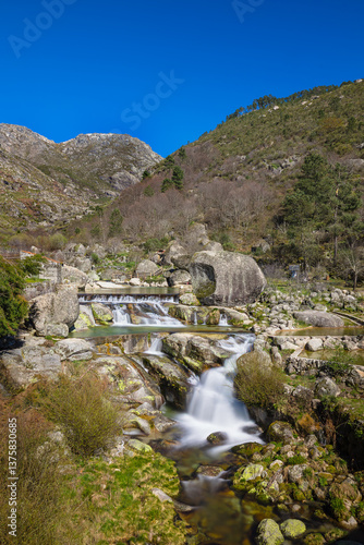 Beautifull stone natural pool with waterfalls in the iconic place of Loriga - Portugal, with stone mountain background