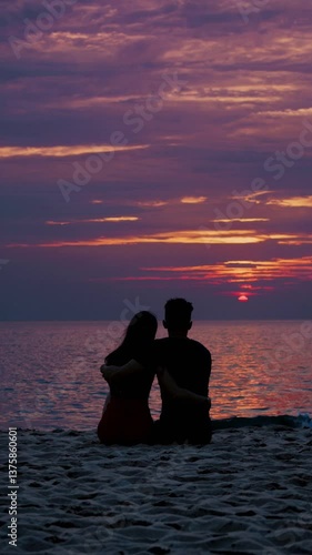 Couple Embracing at Sunset on the Beach