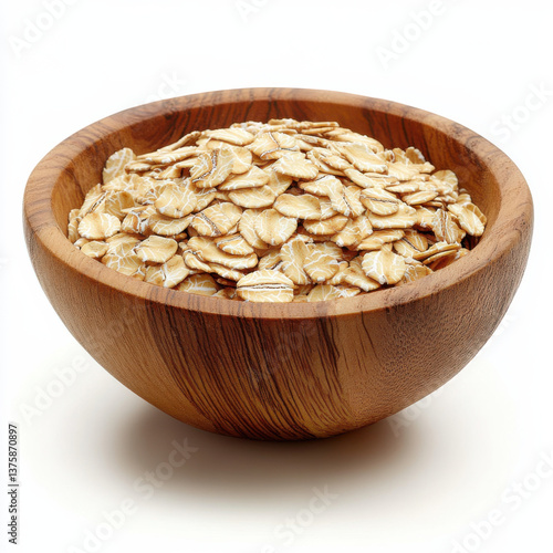 a wooden bowl filled with rolled oats, overflowing slightly to emphasize their texture and natural color. 