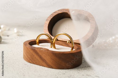 Wedding rings in wooden box...